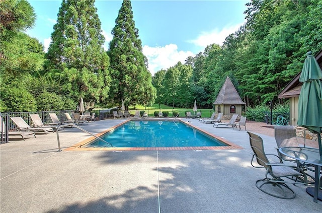 16 Cambridge Way, Cartersville, GA 30121 - community pool with a patio area and view of scattered trees