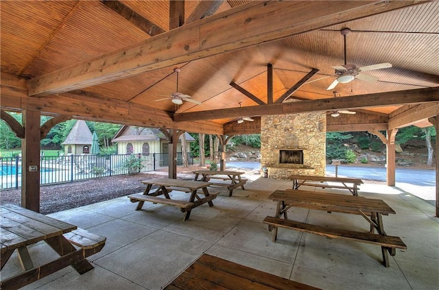 16 Cambridge Way, Cartersville, GA 30121 - view of patio / terrace with ceiling fan, an outdoor stone fireplace, and a gazebo