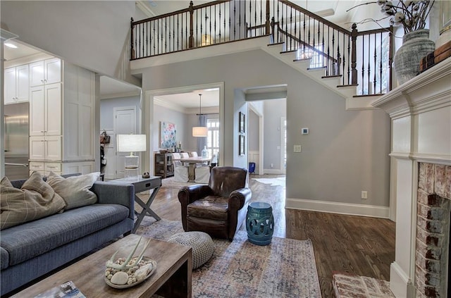 16 Cambridge Way, Cartersville, GA 30121 - living area featuring crown molding, a high ceiling, and wood finished floors