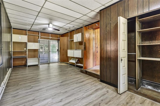 3137 Ardley Rd SW, Atlanta, GA 30311 - mudroom featuring wood finished floors, a drop ceiling, baseboard heating, wooden walls, and a ceiling fan