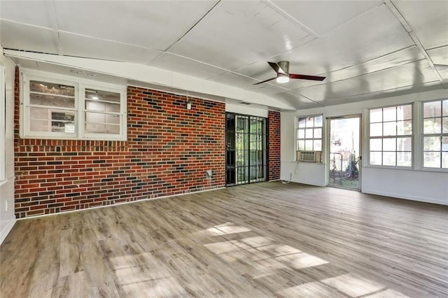 unfurnished sunroom featuring cooling unit