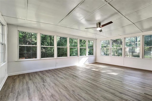 3137 Ardley Rd SW, Atlanta, GA 30311 - unfurnished sunroom with a deck, wood finished floors, and baseboards