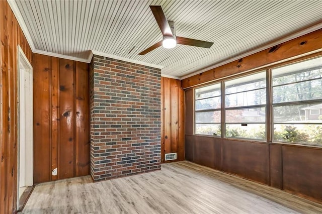 unfurnished sunroom with visible vents