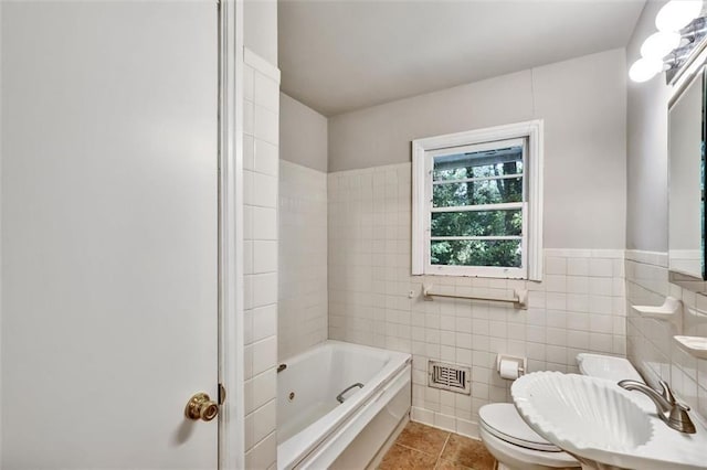 3137 Ardley Rd SW, Atlanta, GA 30311 - full bath with tile patterned flooring, a sink, tile walls, toilet, and a combined bath / shower with jetted tub