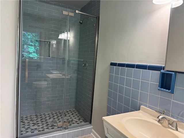 3137 Ardley Rd SW, Atlanta, GA 30311 - bathroom featuring a stall shower, a sink, and tile walls