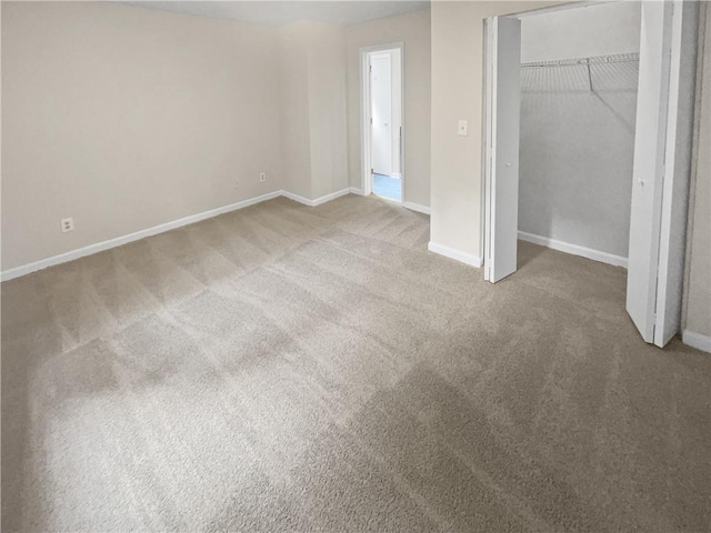 1097 Rock Creek Ln, Norcross, GA 30093 - unfurnished bedroom with a closet and carpet flooring