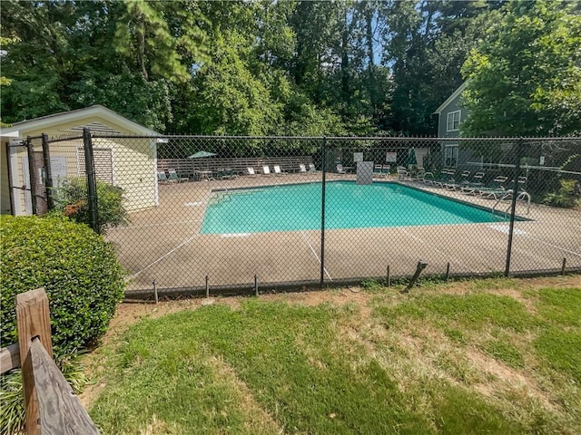 1097 Rock Creek Ln, Norcross, GA 30093 - view of swimming pool featuring a lawn