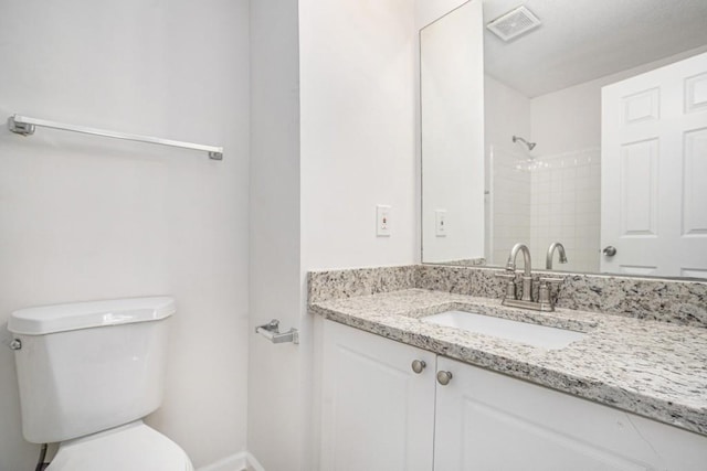 277 Ralph David Abernathy Blvd SW, Atlanta, GA 30312 - bathroom with toilet, vanity, and a shower