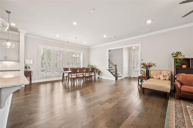 993 Harvest Park Ln, Suwanee, GA 30024 - dining area with stairs, dark wood-style floors, ceiling fan, ornamental molding, and baseboards