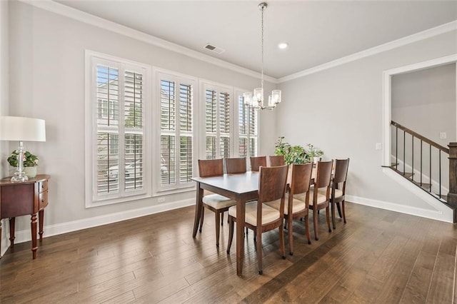 993 Harvest Park Ln, Suwanee, GA 30024 - dining room featuring a chandelier, dark wood-style floors, baseboards, stairs, and crown molding