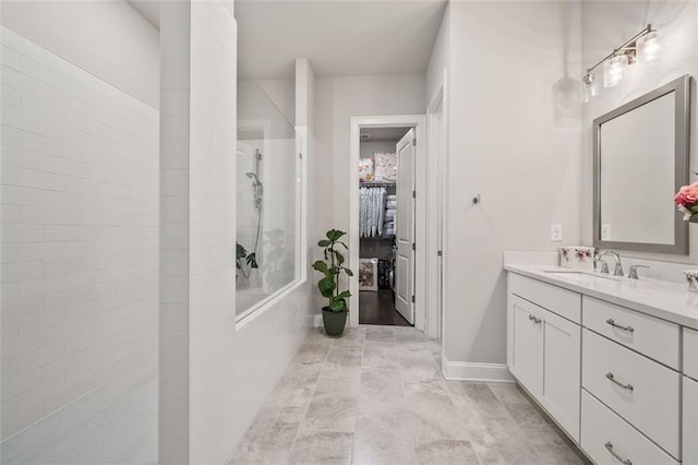 993 Harvest Park Ln, Suwanee, GA 30024 - full bath featuring a walk in shower, vanity, and a spacious closet