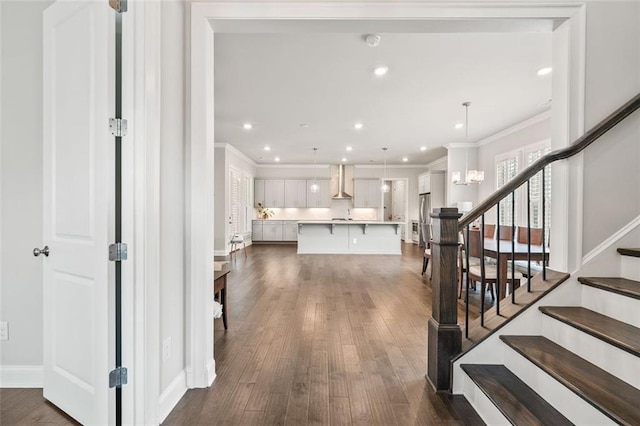 993 Harvest Park Ln, Suwanee, GA 30024 - foyer with ornamental molding, stairway, dark wood finished floors, a chandelier, and recessed lighting