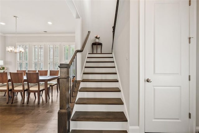 993 Harvest Park Ln, Suwanee, GA 30024 - stairs featuring a chandelier, wood finished floors, ornamental molding, and recessed lighting