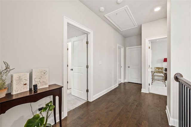 993 Harvest Park Ln, Suwanee, GA 30024 - hall with attic access, dark wood-style flooring, and baseboards