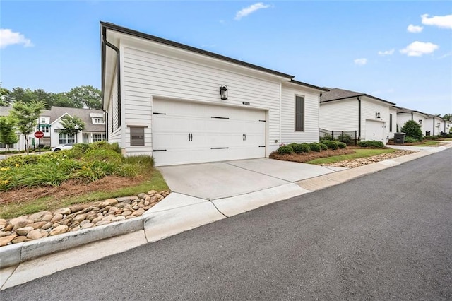 993 Harvest Park Ln, Suwanee, GA 30024 - view of front of home featuring an attached garage and driveway