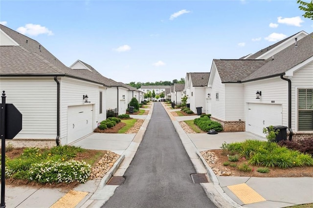 993 Harvest Park Ln, Suwanee, GA 30024 - view of asphalt road featuring a residential view
