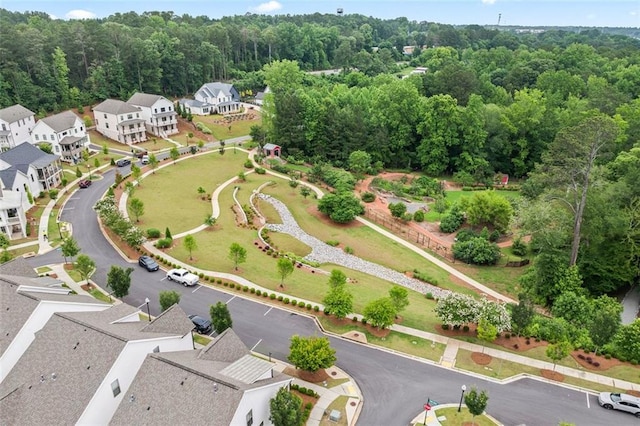 993 Harvest Park Ln, Suwanee, GA 30024 - aerial perspective of suburban area featuring a heavily wooded area