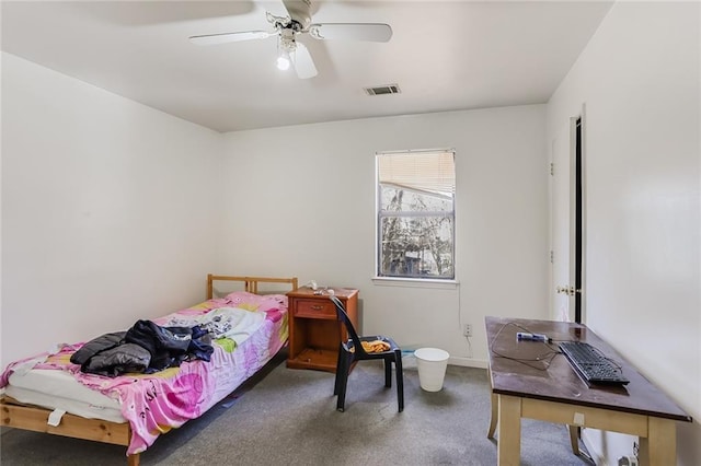 bedroom featuring dark carpet and ceiling fan