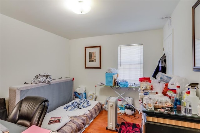 bedroom with light hardwood / wood-style flooring