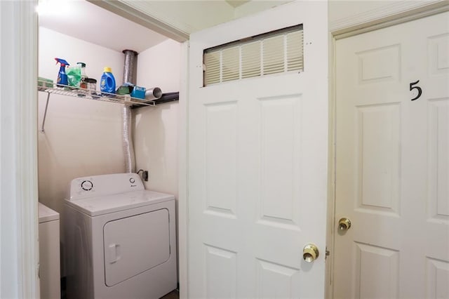 laundry room featuring washer and dryer and electric dryer hookup