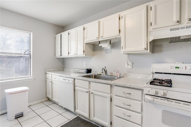 kitchen featuring premium range hood, light tile flooring, white appliances, white cabinetry, and sink