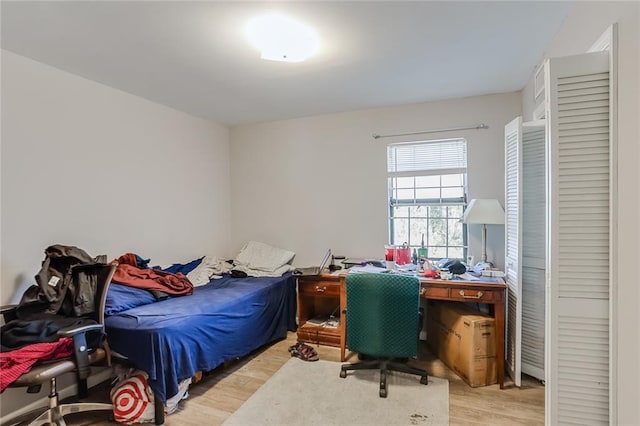 bedroom with light hardwood / wood-style flooring