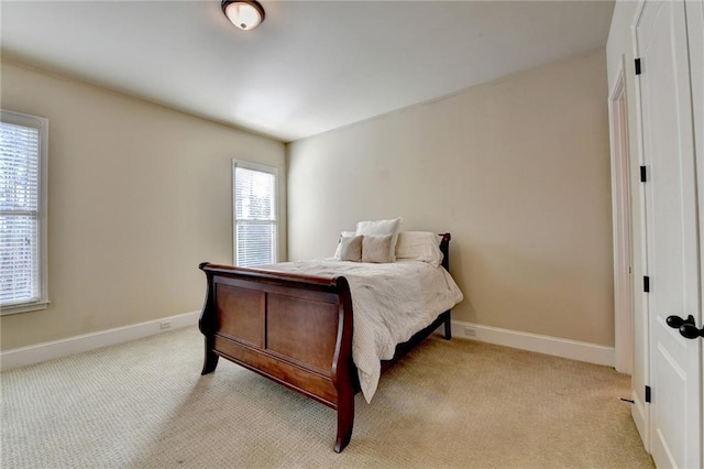 bedroom with light carpet