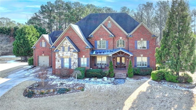 view of front facade with french doors and a garage