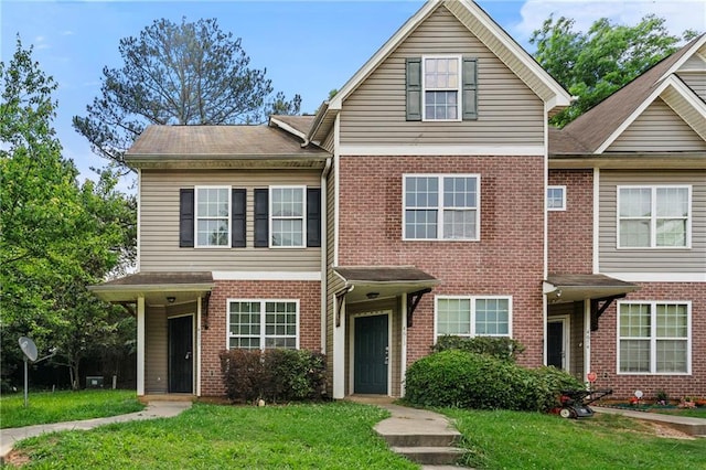 4670 Ernest Dr, Forest Park, GA 30297 - view of front of home featuring a front lawn and brick siding