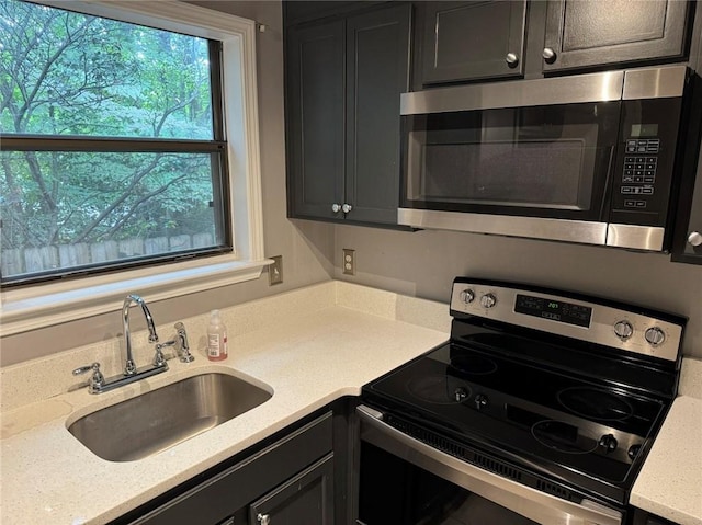 kitchen featuring sink and appliances with stainless steel finishes