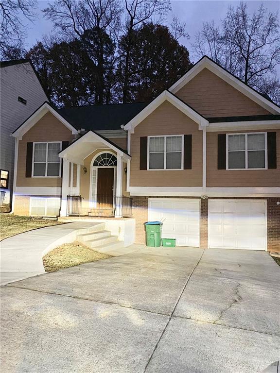 view of front of home with a garage