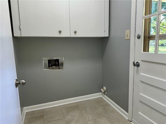 laundry area featuring baseboards, washer hookup, and plenty of natural light