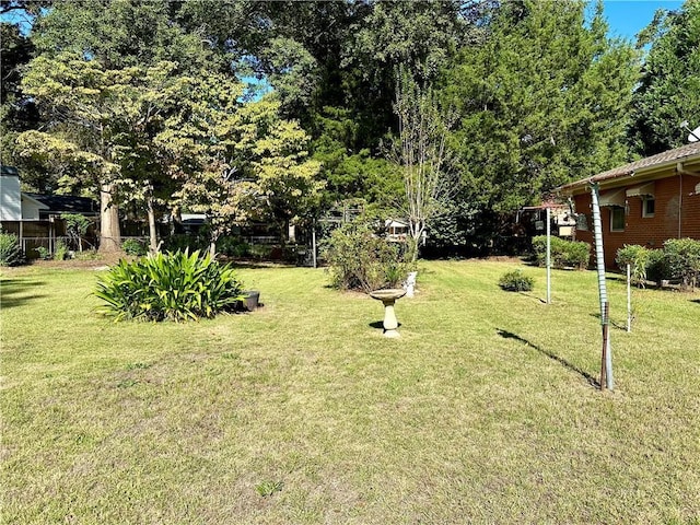view of yard with fence