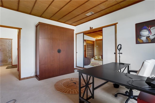 carpeted office space featuring wood ceiling