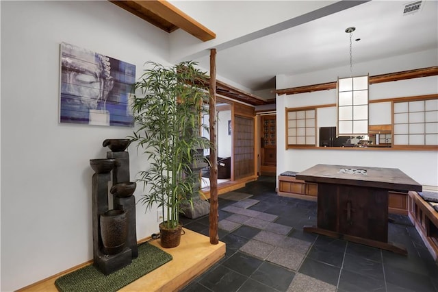 kitchen with black refrigerator