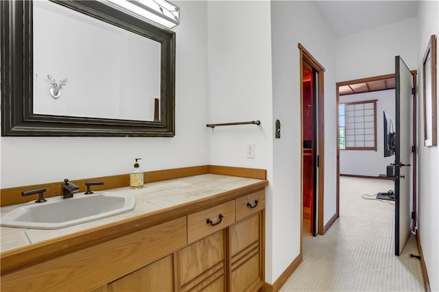 bathroom featuring tile patterned floors and vanity