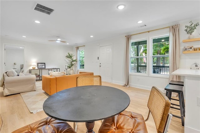5601 Due W Rd, Powder Springs, GA 30127 - dining area with light wood-type flooring, recessed lighting, crown molding, and ceiling fan