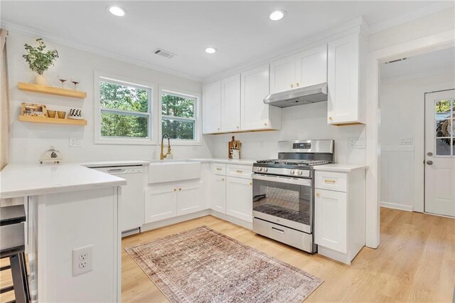 5601 Due W Rd, Powder Springs, GA 30127 - kitchen featuring stainless steel range with gas stovetop, dishwasher, under cabinet range hood, ornamental molding, and a peninsula