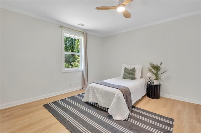 5601 Due W Rd, Powder Springs, GA 30127 - bedroom featuring wood finished floors, ornamental molding, and a ceiling fan