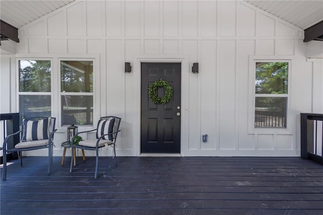 5601 Due W Rd, Powder Springs, GA 30127 - doorway to property featuring board and batten siding and a deck