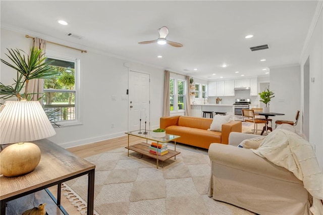 5601 Due W Rd, Powder Springs, GA 30127 - living room featuring crown molding, recessed lighting, ceiling fan, and light wood finished floors