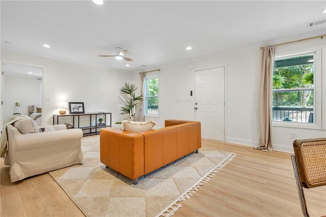 5601 Due W Rd, Powder Springs, GA 30127 - living area with light wood-style flooring, recessed lighting, ceiling fan, and crown molding