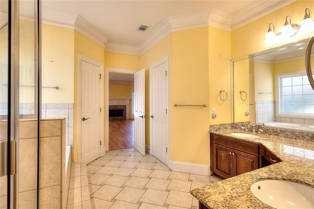 1595 Lake Lucerne Rd SW, Lilburn, GA 30047 - bathroom with double vanity, a garden tub, a fireplace, ornamental molding, and tile patterned flooring