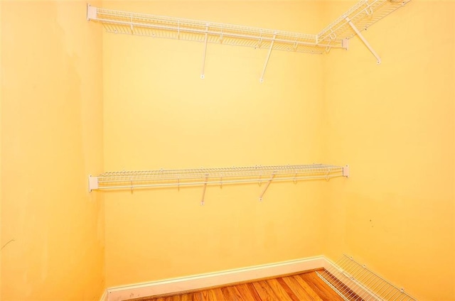 1595 Lake Lucerne Rd SW, Lilburn, GA 30047 - walk in closet featuring light wood-style floors
