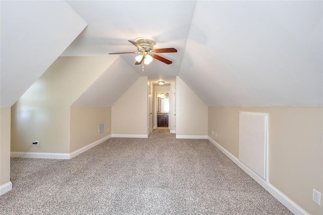 1595 Lake Lucerne Rd SW, Lilburn, GA 30047 - bonus room featuring a ceiling fan, carpet floors, baseboards, and lofted ceiling
