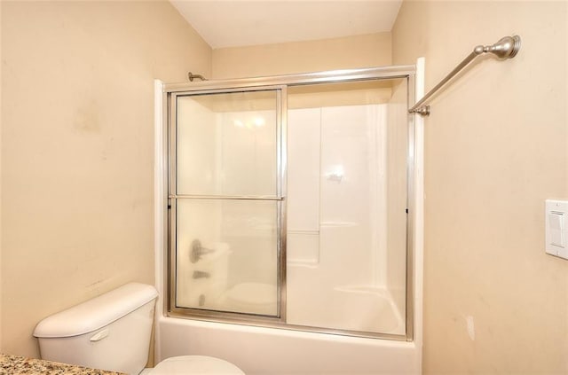 1595 Lake Lucerne Rd SW, Lilburn, GA 30047 - bathroom featuring enclosed tub / shower combo and toilet