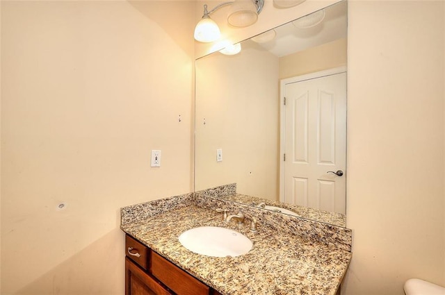 1595 Lake Lucerne Rd SW, Lilburn, GA 30047 - bathroom featuring vanity and toilet