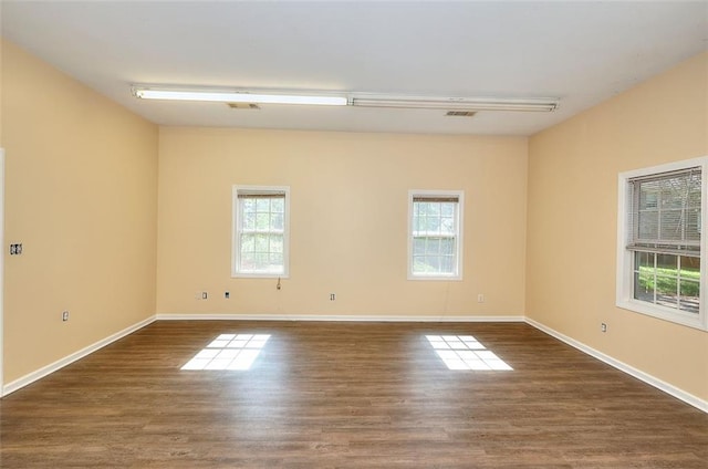 1595 Lake Lucerne Rd SW, Lilburn, GA 30047 - empty room featuring wood finished floors and baseboards