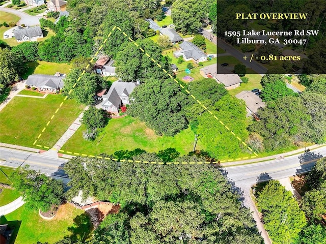 1595 Lake Lucerne Rd SW, Lilburn, GA 30047 - aerial overview of property's location featuring property parcel outlined and nearby suburban area
