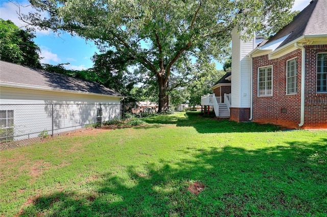 1595 Lake Lucerne Rd SW, Lilburn, GA 30047 - view of green lawn with stairway